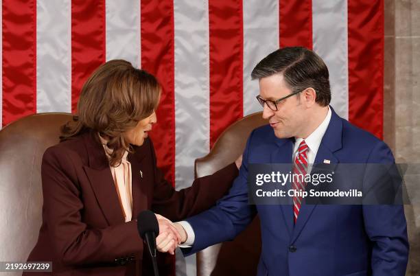 Vice President Kamala Harris shakes hands with U.S. Speaker of the House Mike Johnson after Harris certifies the Electoral College vote during a...