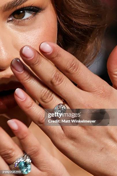 Zendaya, ring detail, attends the 82nd Annual Golden Globe Awards at The Beverly Hilton on January 05, 2025 in Beverly Hills, California.