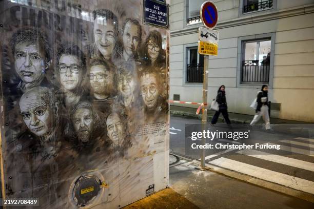 Mural by artist Christian Guemy, dedicated to the staff of the Charlie Hebdo newspaper who were killed by terrorist gunmen in January 2015, adorns a...