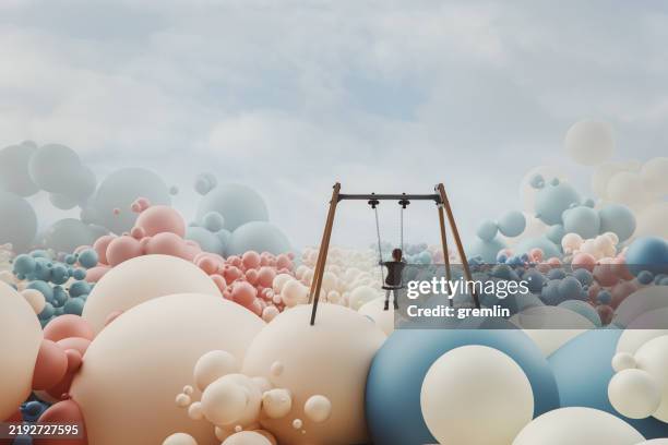 niño en un columpio imaginando cosas - imaginación fotografías e imágenes de stock