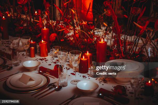 romantic candlelit dinner table setting for valentine’s day - candlelight stock pictures, royalty-free photos & images