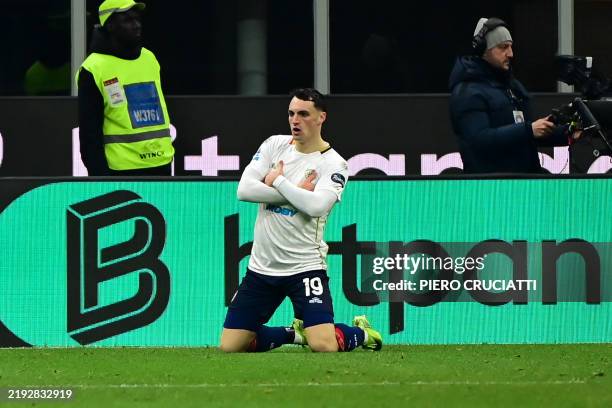 Cagliari's Italian defender Nadir Zortea celebrates after scoring his team first goal during the Italian Serie A football match between AC Milan and...