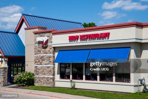 Lansing, Kansas. IHOP Restaurant. IHOP specializes in American breakfast foods. But also includes a standard lunch and dinner menu.