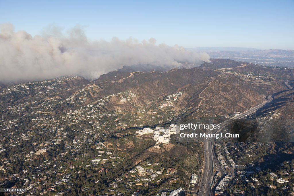 Helicopter aerial views of Palisades fire and Eaton fire.