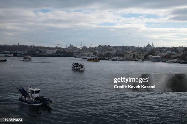 The city skyline with Golden Horn seen in the foreground from an elevated point on Ataturk Bridge on November 20, 2024 in Istanbul, Turkiye.