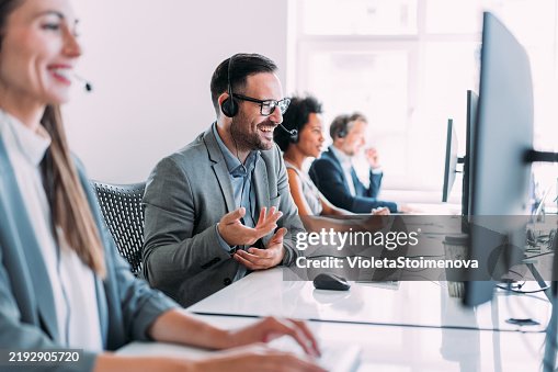 Call center workers. Call center workers.