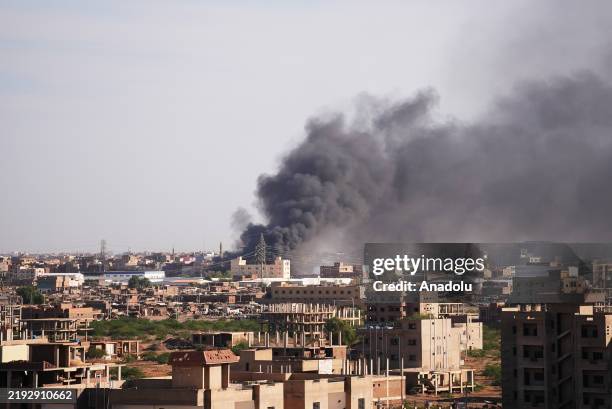 Smoke rises over the frontline, where clashes between the army and the Rapid Support Forces take place in Khartoum, Sudan on December 27, 2024.