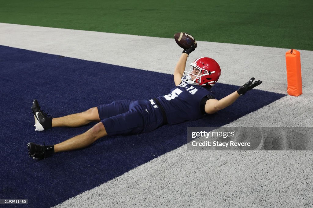 Native All Stars Nathan Benzie of Team Wa'Ya celebrates a touchdown during the Native ...