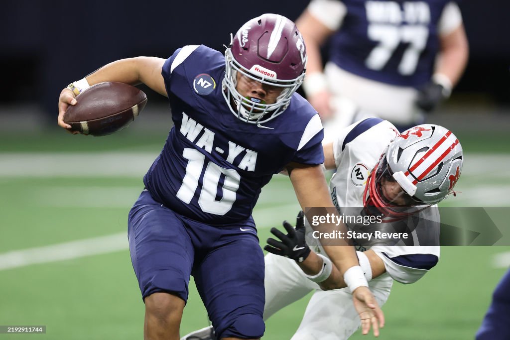 Native All Stars Isaac Trajan of Team Wa'Ya is brought down by Trent Tall of Team ...