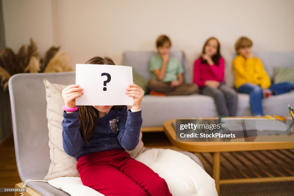 Questioning Child Image Child Holding Question Mark In Front Of Her Face High-Res Stock Photo ...