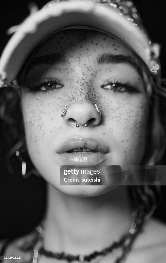 The young woman.
