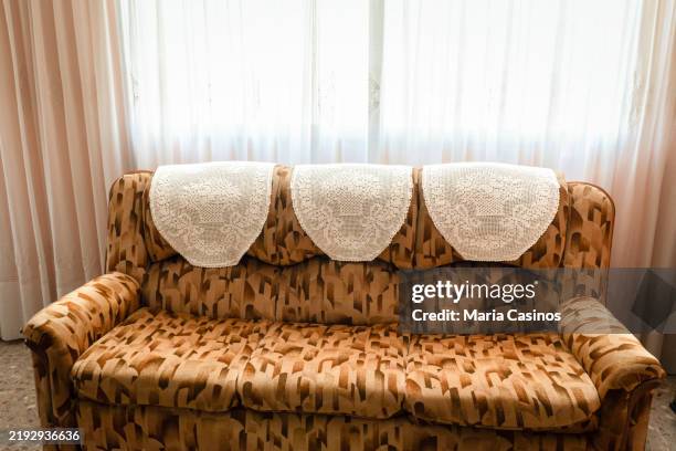 retro sofa by the window - doily pattern stock pictures, royalty-free photos & images