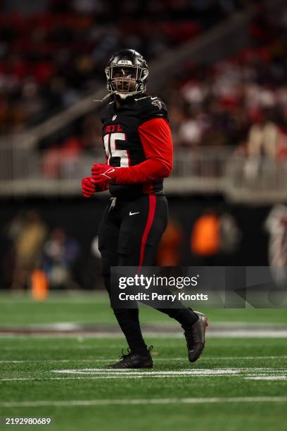 Matthew Judon of the Atlanta Falcons looks on from the field during an NFL football game against the Carolina Panthers at Mercedes-Benz Stadium on...