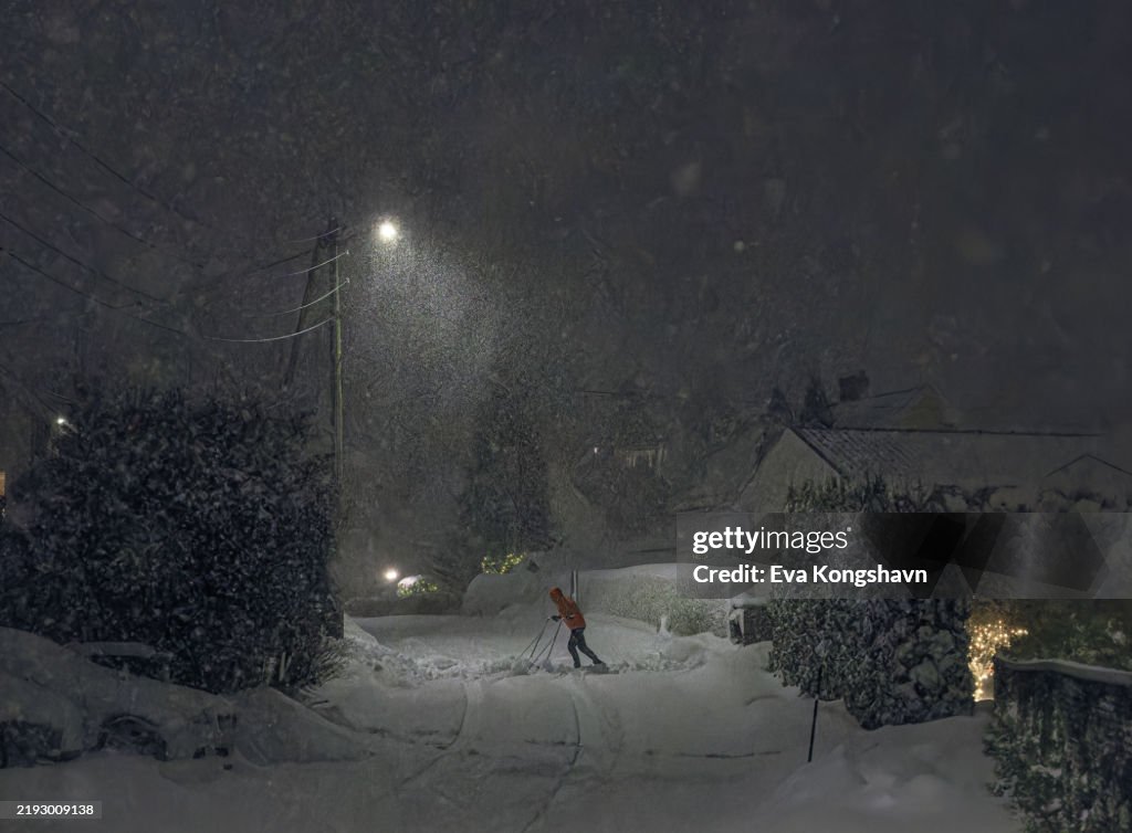 The big snow thrower is very heavy with all the snow