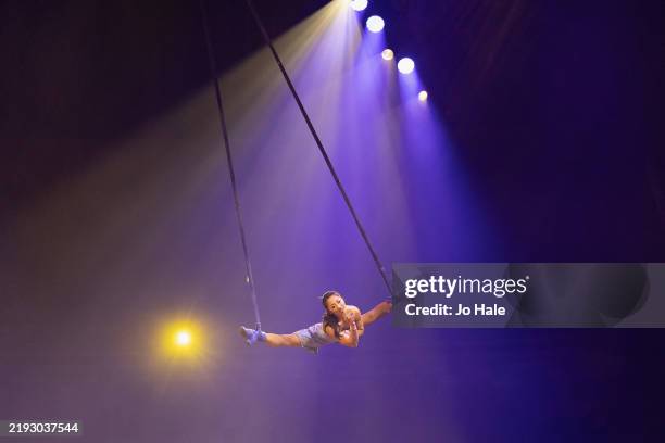 Acrobats perform during the dress rehearsal for Cirque du Soleil's "Corteo" at Royal Albert Hall on January 08, 2025 in London, England.
