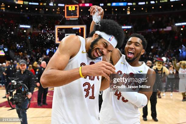 Jarrett Allen celebrates with Donovan Mitchell of the Cleveland Cavaliers after the game against the Oklahoma City Thunder at Rocket Mortgage...