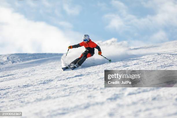 teenage boy spending winter holiday skiing in mountain - esqui equipamento esportivo - fotografias e filmes do acervo