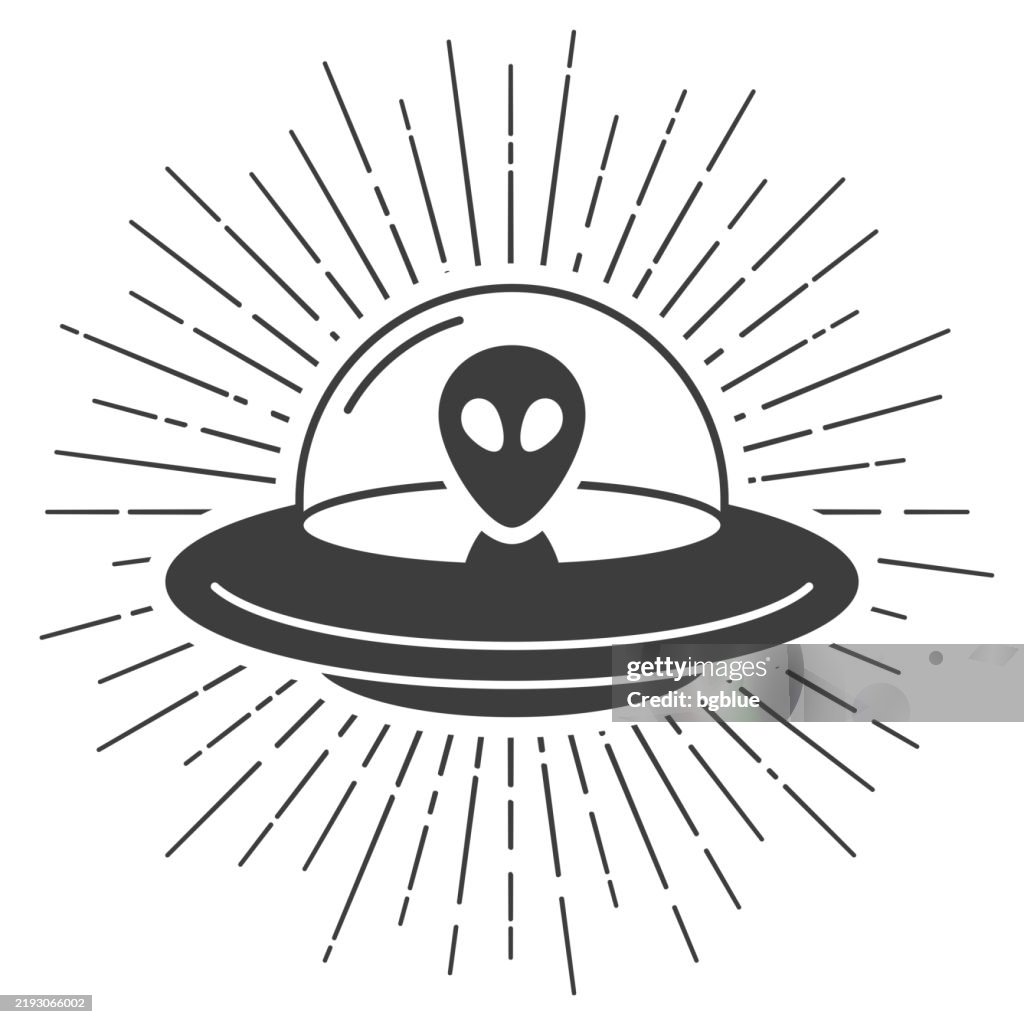 UFO - Flying saucer with alien. Icon with sunbursts on white background