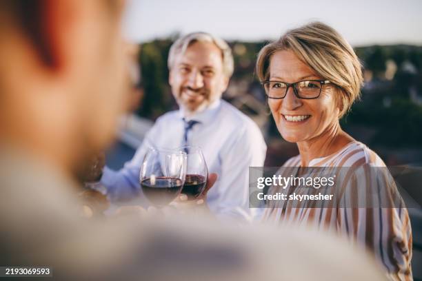 happy businesswoman toasting with her colleague in nature. - honour board stock pictures, royalty-free photos & images