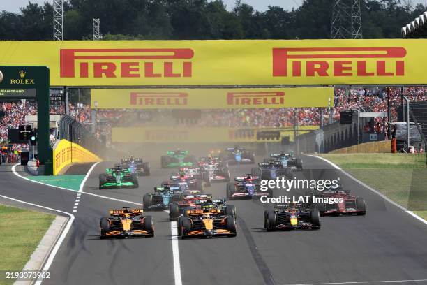 Lando Norris, McLaren MCL38, leads Max Verstappen, Red Bull Racing RB20, Oscar Piastri, McLaren MCL38, Charles Leclerc, Ferrari SF-24, Carlos Sainz,...