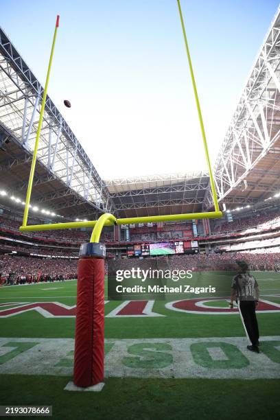 Jake Moody of the San Francisco 49ers kicks a 51-yard field goal during the game against the Arizona Cardinals at State Farm Stadium on January 5,...