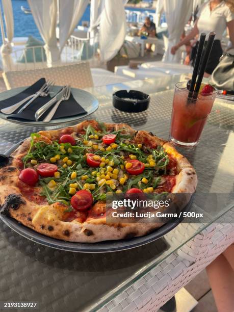 close-up of pizza on table,croatia - garma stock pictures, royalty-free photos & images