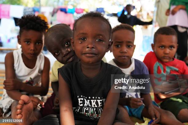 Children are seen as Sudanese people take refuge in a school due to ongoing clashes between military and Rapid Support Forces in Port Sudan, Sudan on...