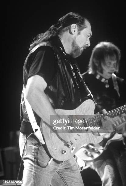 Steve Cropper and Neil Young perform at Shoreline Amphitheatre on September 8, 1993 in Mountain View, California.