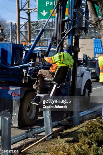 Worker Installing Sign Post 101 Installing Fence Post Stock Photos, High-Res Pictures, and Images ...