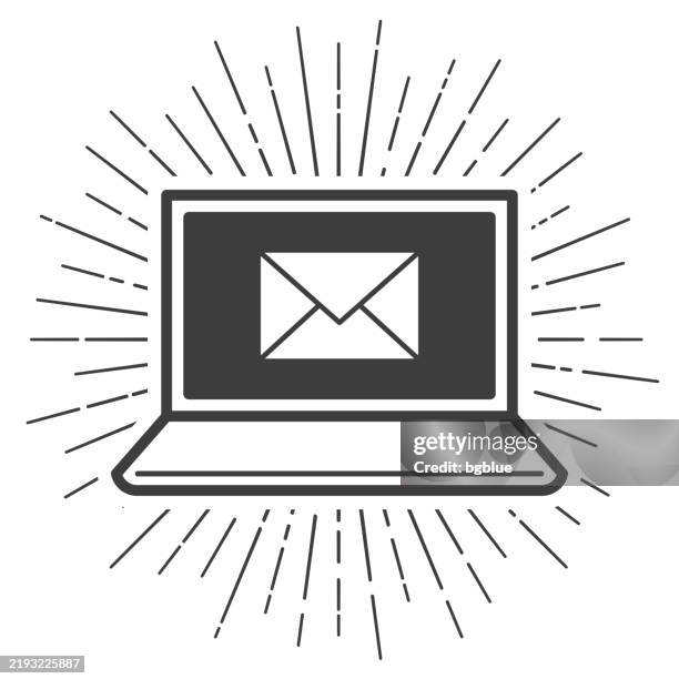 laptop with email message. icon with sunbursts on white background - old laptops stock illustrations