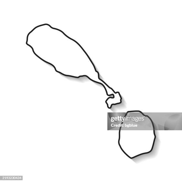 saint kitts and nevis map with black outline and shadow on white background - st kitts stock illustrations