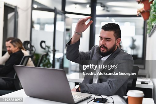 Male Sales Executive Yelling at Laptop Being Disappointed After Missing Important Deal With Client Male Sales Executive Yelling at Laptop Being Disappointed After Missing Important Deal With Client