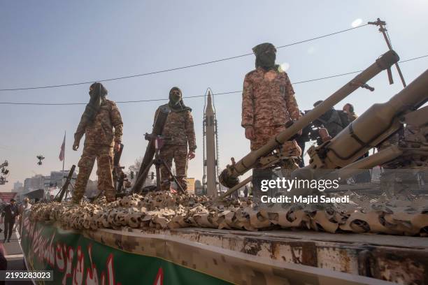 Iranian Basij militia members display short-range projectiles during military manoeuvres on January 10, 2025 in Tehran, Iran. The Islamic...