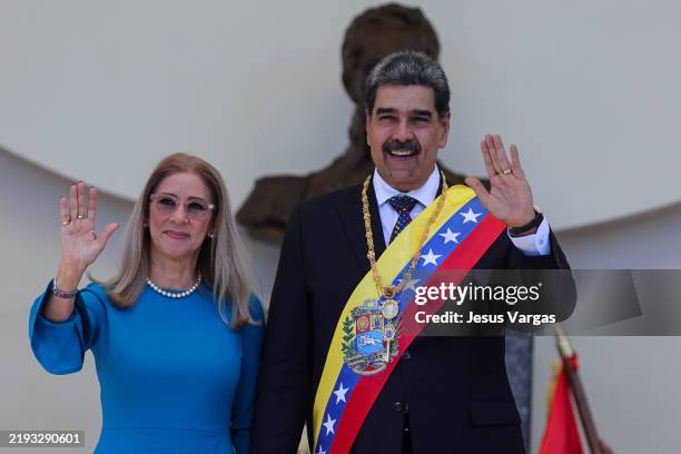 President of Venezuela Nicolas Maduro and his wife Cilia Flores hold hands and pose for photos after the swear-in ceremony at Palacio Federal...