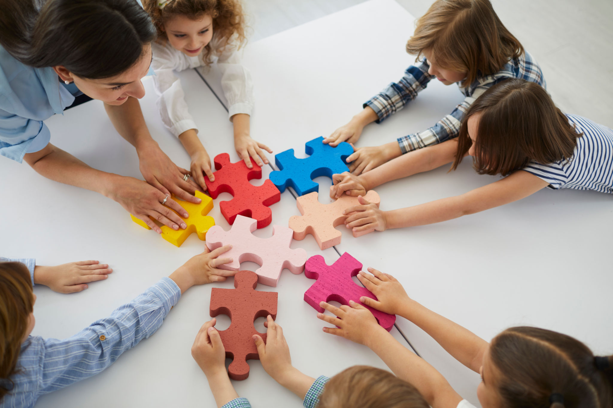 children teamwork puzzle