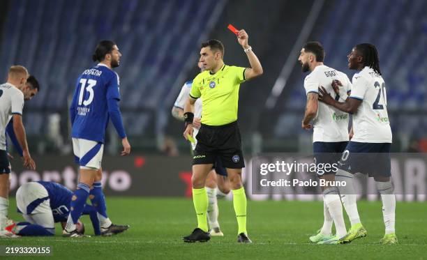 Loum Tchaouna of Lazio is shown a red card by Referee Paride Tremolada during the Serie A match between SS Lazio and Como at Stadio Olimpico on...