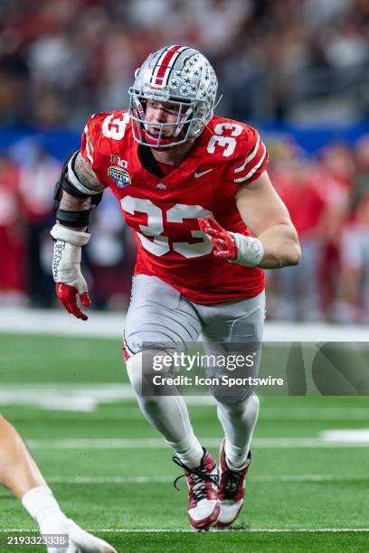 Ohio State Buckeyes defensive end Jack Sawyer runs up field during the CFP Semifinal Cotton Bowl Classic football game between the Ohio State...