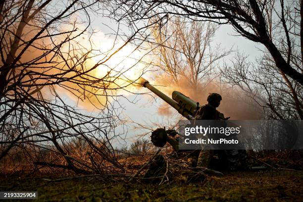 Soldiers of an artillery crew of the Rifle Battalion Special Unit of the Main Department of the National Police in the Zaporizhzhia region fire a...