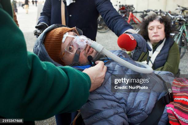 Camille speaks with journalists. The NGO Handi'social calls for a gathering in front of Purpan's teaching hospital to protest against the only choice...
