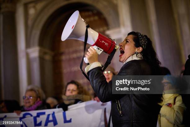Woman shouts slogans during a protest in support of Juana Rivas and her son Daniel in Granada, Spain, on January 14, 2025. Juana Rivas's ongoing...