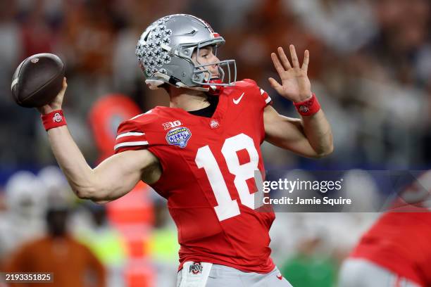 Will Howard of the Ohio State Buckeyes throws a pass in the fourth quarter against the Texas Longhorns during the Goodyear Cotton Bowl at AT&T...