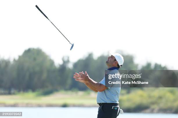 Francesco Molinari, Captain of Team Continental Europe throws his putter up as he reacts to a missed putt on the 17th green during the foursomes...