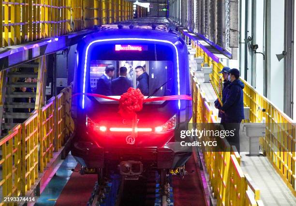 Metro train, the world's first carbon fiber metro train, begins operation on January 10, 2025 in Qingdao, Shandong Province of China. The CETROVO 1.0...