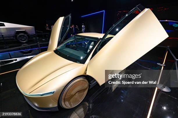 Tesla Cybercab or Robotaxi two-passenger battery-electric self-driving car on display at the AutoSalon on January 10, 2025 in Brussels, Belgium.
