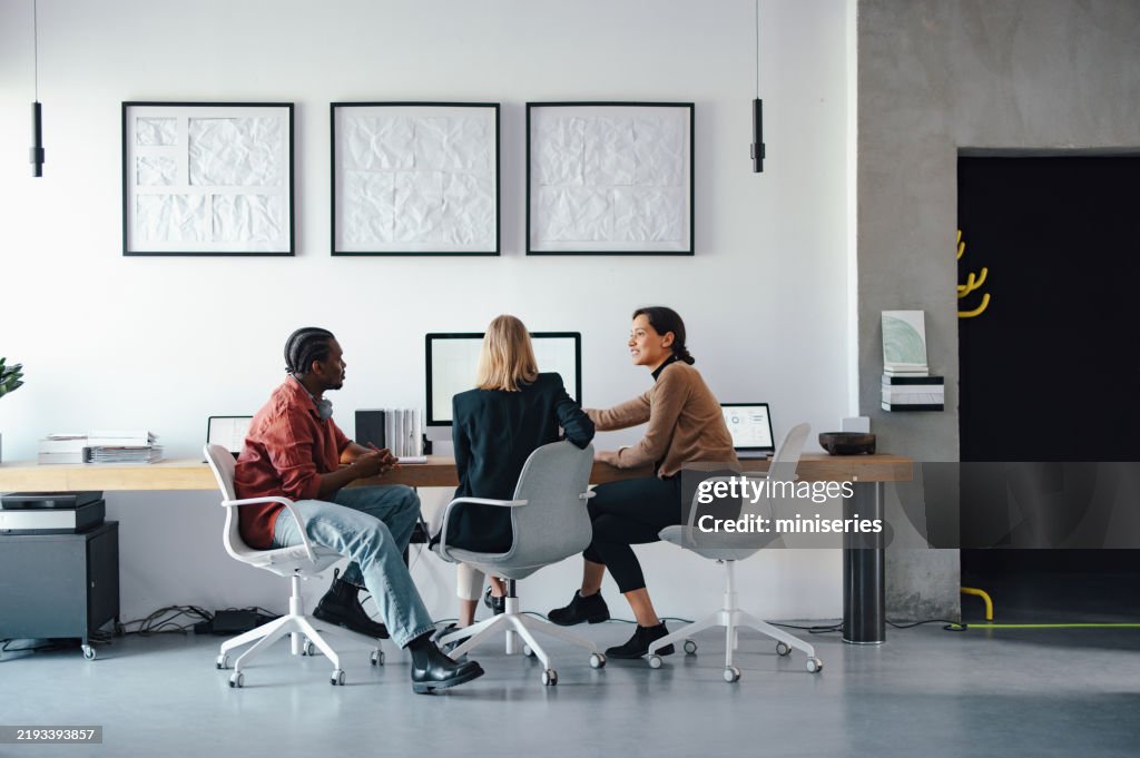 Business Team Collaborating in Modern Office Environment