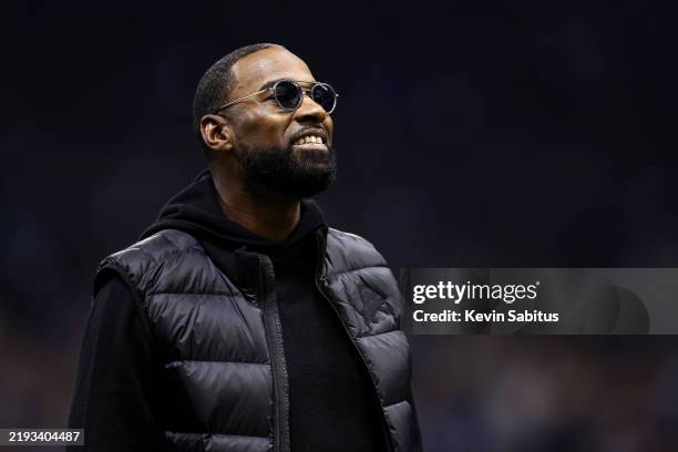 Former Detroit Lions wide receiver Calvin Johnson is honored during a timeout during an NFL football game between the Detroit Lions and the Minnesota...