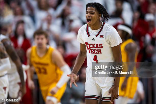 Christian Anderson of the Texas Tech Red Raiders reacts after making a three-pointer during the first half of the game against the Iowa State...