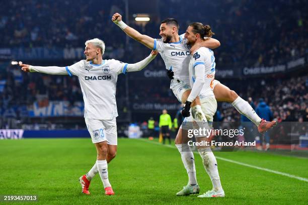 Adrien Rabiot of Olympique de Marseille celebrates with Neal Maupay of Olympique de Marseille after scoring his team's second goal during the Ligue 1...