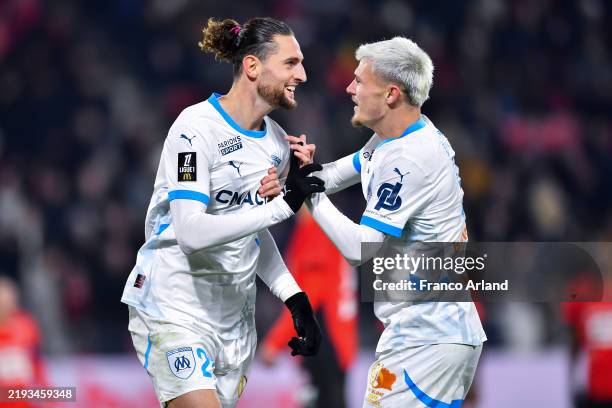 Adrien Rabiot of Olympique de Marseille celebrates with Quentin Merlin of Olympique de Marseille after scoring his team's second goal during the...