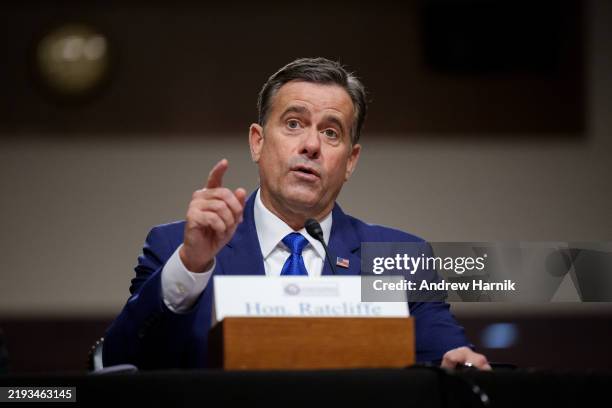 President-elect Donald Trump's nominee for CIA Director John Ratcliffe speaks during a Senate Intelligence confirmation hearing on Capitol Hill on...